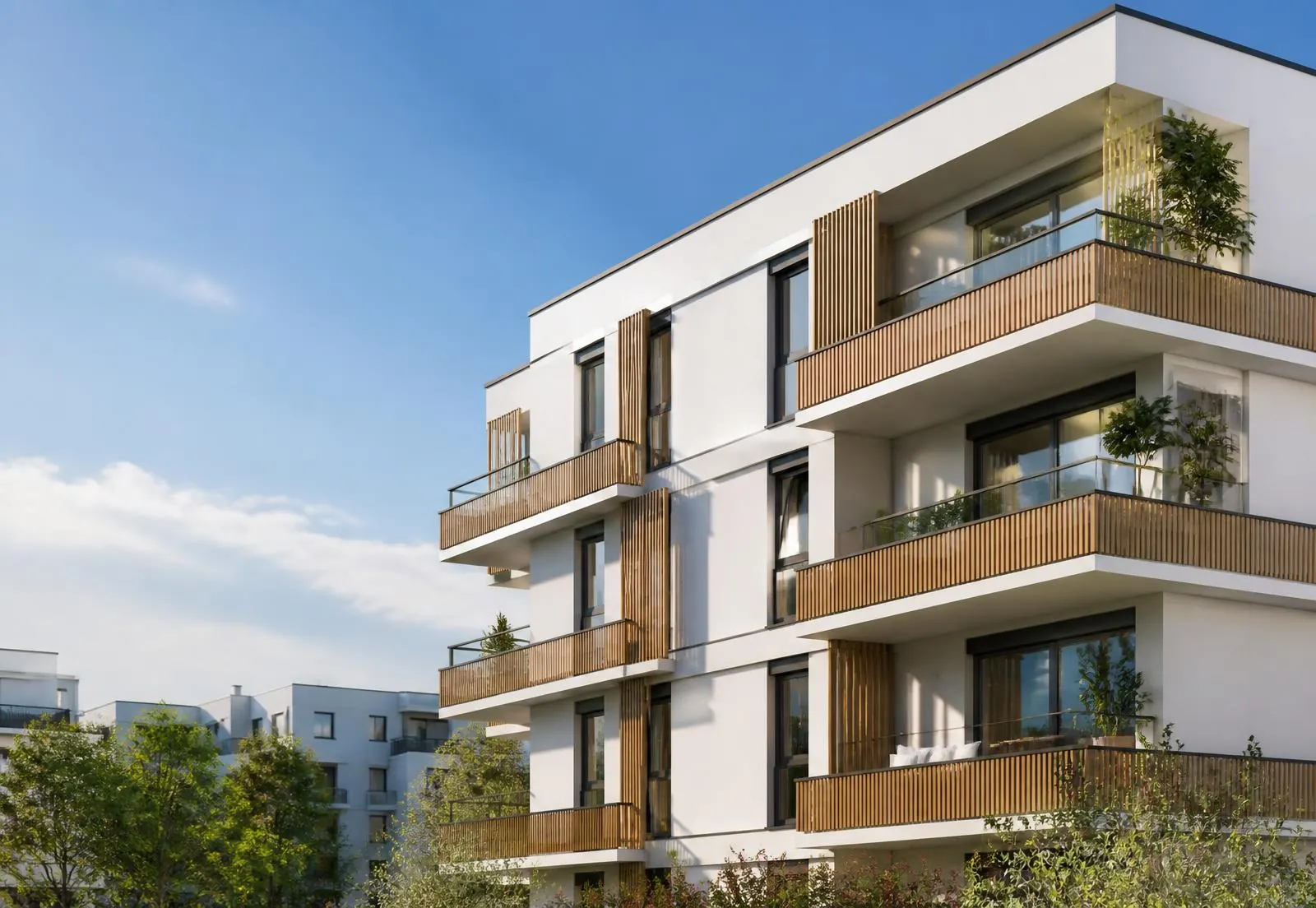Modern German apartment building with white facade and wooden balconies